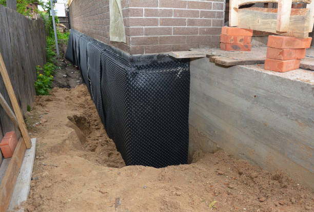 Happy homeowners after waterproofing job in North Robinson